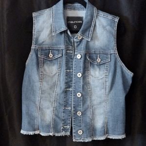85. Jean Vest